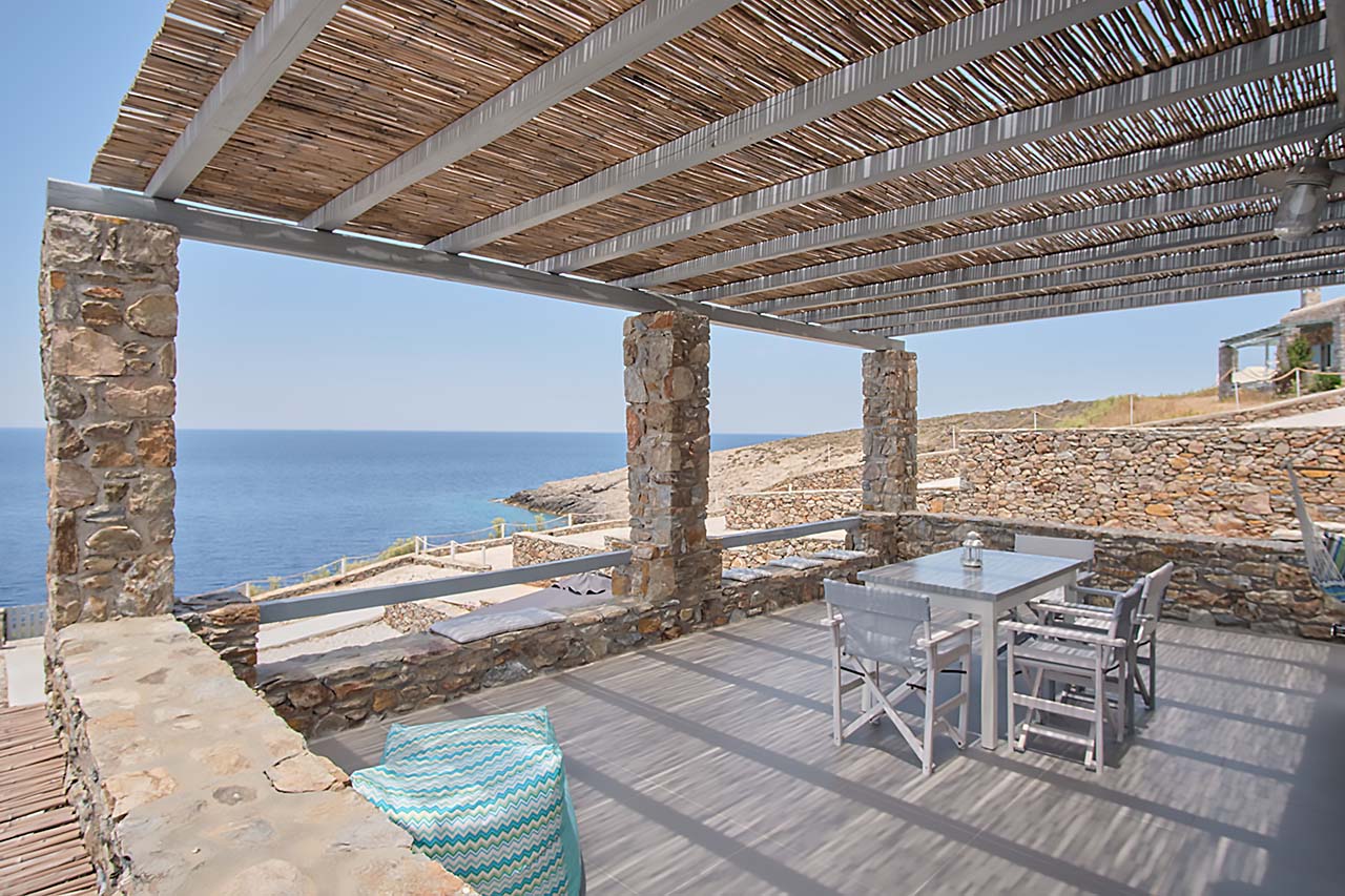 Every suite has an private patio overlooking the Aegean Sea